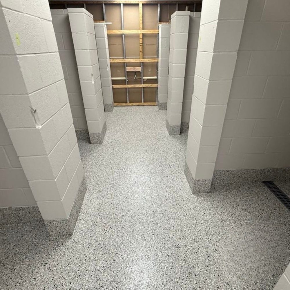 Epoxy floor coating in concrete block commercial building Kansas City MO