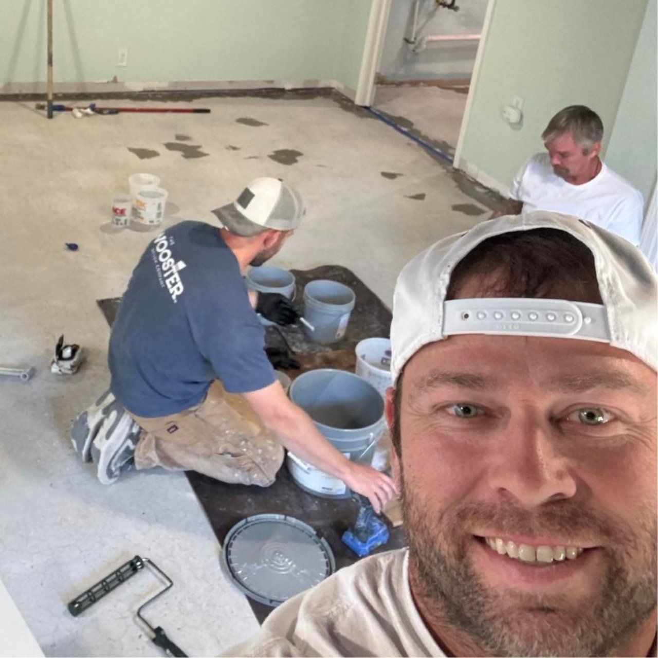 HH Next-Level Epoxy crew preparing basement floor concrete for epoxy coating Kansas City